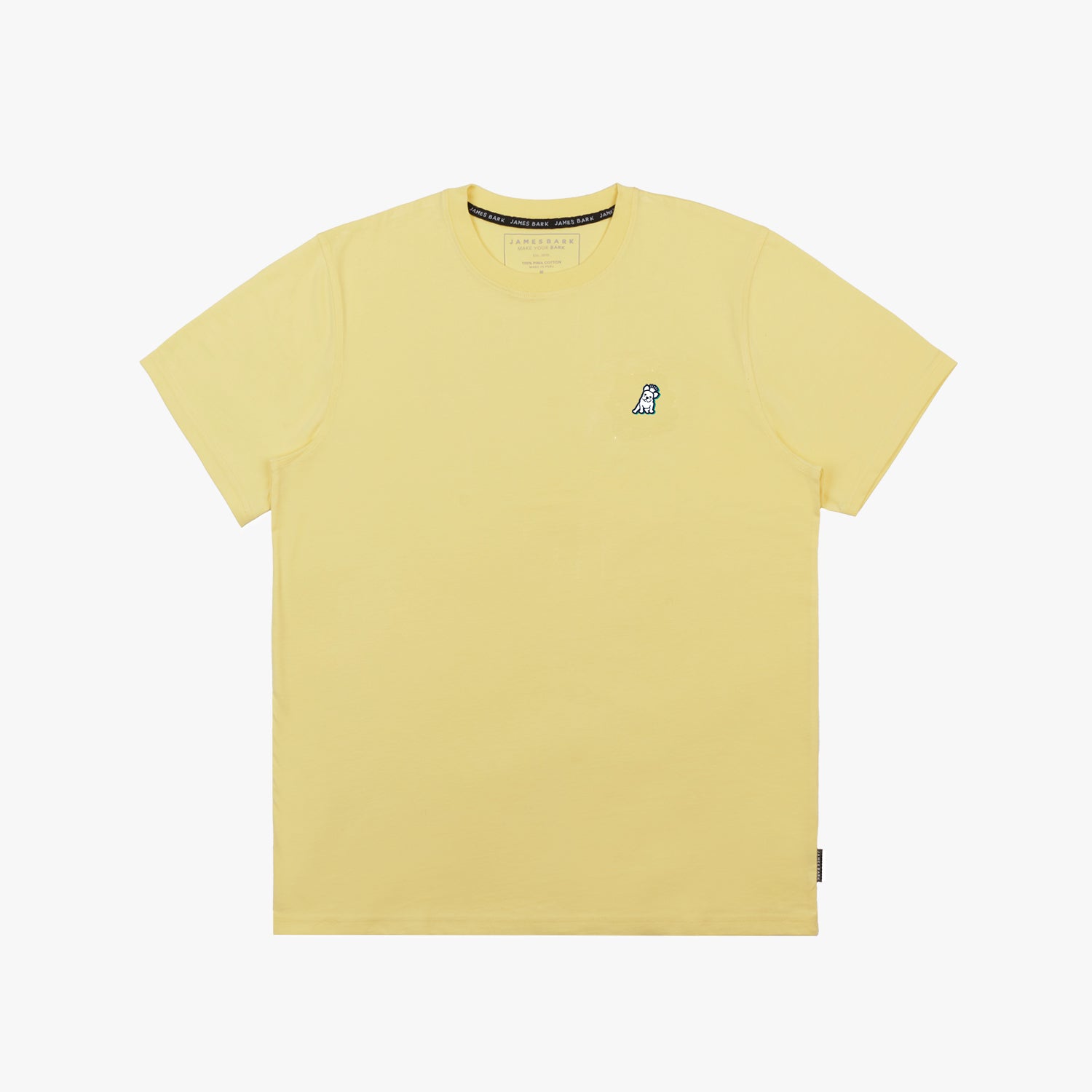 A flat lay of the yellow T-shirt, displaying the small embroidered dog logo on the chest.