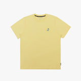 A flat lay of the yellow T-shirt, displaying the small embroidered dog logo on the chest.