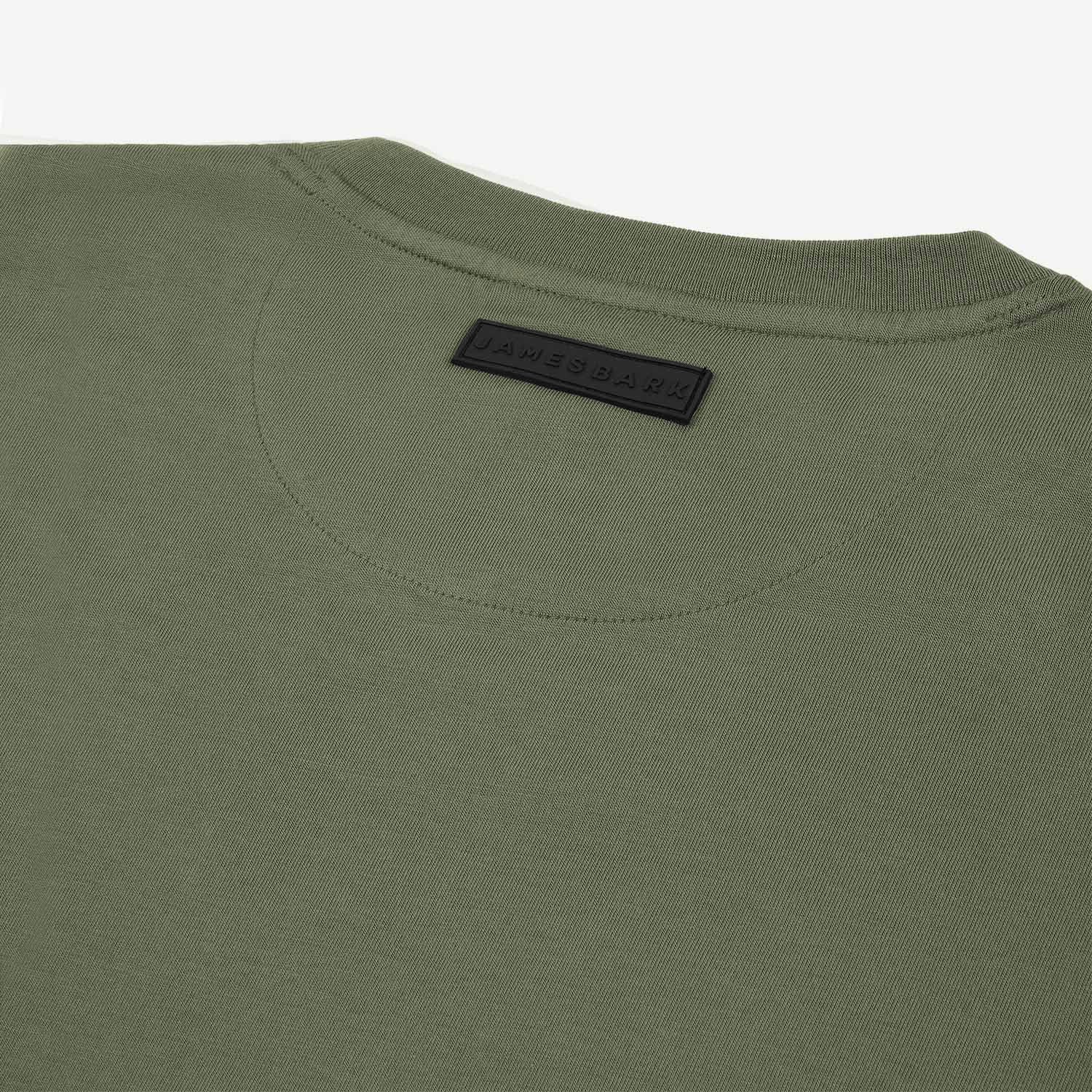 The olive green t-shirt laid flat, showing the back view