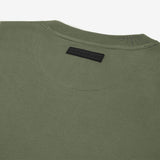 The olive green t-shirt laid flat, showing the back view