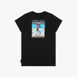 Back flat-lay view of the black t-shirt showcasing the beach graphic with lifeguard chairs and a dog.