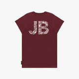 Back flat-lay view of the burgundy t-shirt showing the "JB" graphic in white.
