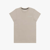 A beige short-sleeved T-shirt featuring a subtle tonal logo patch on the upper left chest area that reads 'JAMES BARK.' The neckline includes a black inner lining with repeated 'JAMES BARK' branding, and the inside label also displays the brand name