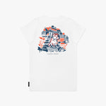 Back flat-lay view of the white t-shirt showing the colorful graphic of buildings and a dog illustration.