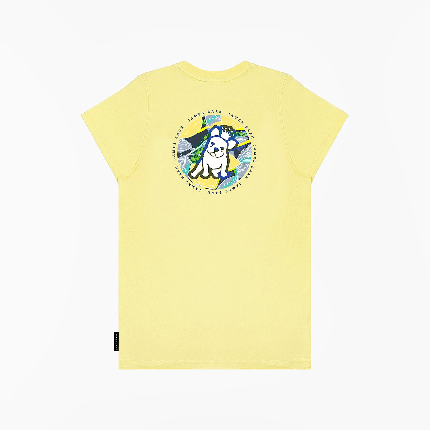 A flat lay of the back of the yellow T-shirt, showing the large circular graphic with the tropical background and dog illustration, along with "James Bark Privé Society" text.