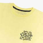 A close-up of the T-shirt’s neckline, showing the inner label that says "James Bark."