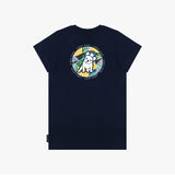 A flat lay of the back of the navy blue T-shirt, showing the large circular graphic with the tropical background and dog illustration, along with "James Bark Privé Society" text.