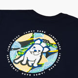 A close-up of the back design on the navy blue T-shirt, showing the large circular graphic with the dog and tropical background, along with "James Bark Privé Society" text around the circle.