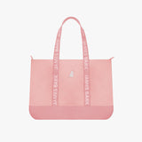 Pink tote bag with 'James Bark' branding on a white background