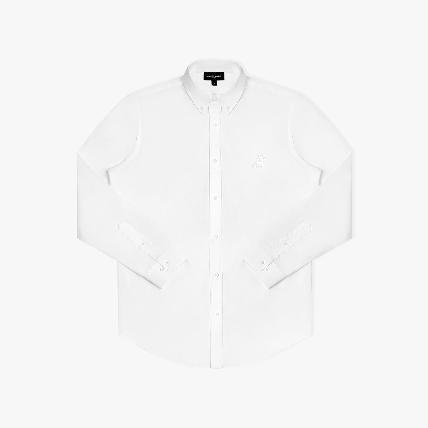 Flat lay front view of a white long-sleeved button-down shirt with white buttons and an embroidered white logo on the left ches