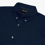 Close-up of a navy blue long-sleeved button-down shirt showing the collar, buttons, embroidered logo, and neck label