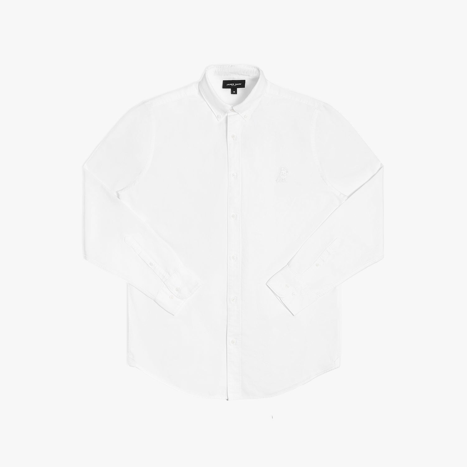 Flat lay photograph of a white long-sleeve button-down oxford shirt with a small white embroidered logo on the left chest and a visible brand label inside the collar, against a white background