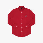 Flat lay photograph of a red long-sleeve button-down oxford shirt with a small white embroidered logo on the left chest and a visible brand label inside the collar, against a white background