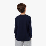Back view of a young boy wearing a navy long-sleeved t-shirt