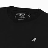 A close-up of the collar and inner label of the black long-sleeved t-shirt, showing the neckline.