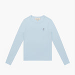 Flat lay of the light blue long-sleeve shirt, showing the small dog graphic on the chest.