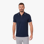 Men wearing a navy blue polo shirt on a white background