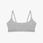 Flat-lay view of a gray bralette with the "James Bark" logo on the elastic band.