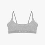 Flat-lay view of a gray bralette with the "James Bark" logo on the elastic band.