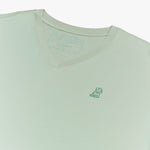 Close-up of the neckline and shoulder seam of the mint green V-neck t-shirt, showing the stitching and fabric texture.