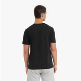 Man wearing a black t-shirt on a white background