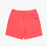 Back view of coral-colored swim trunks showcasing an elastic waistband and a neatly stitched back pocket with branded details.