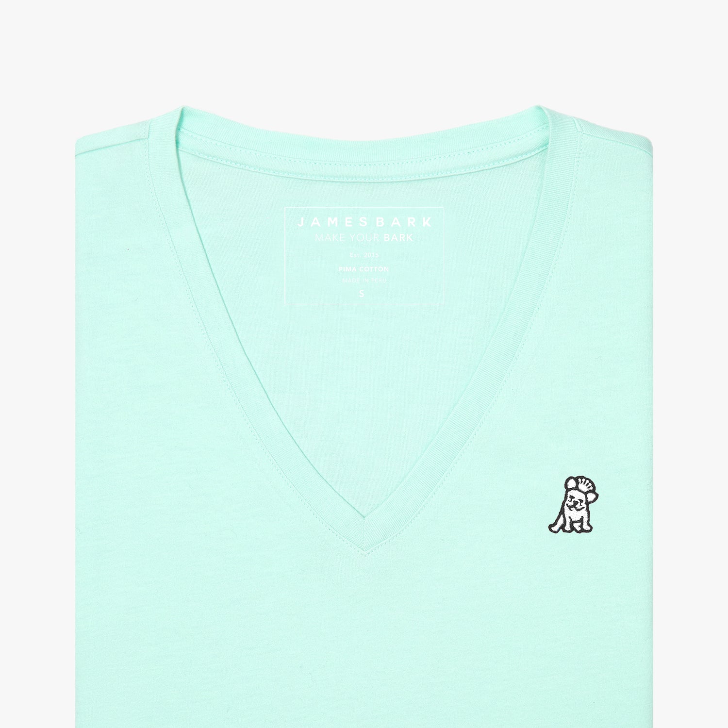 Front view of a mint green women's V-neck t-shirt laid flat against a white background, showing the short sleeves and the black and white embroidered logo on the left chest