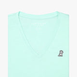 Front view of a mint green women's V-neck t-shirt laid flat against a white background, showing the short sleeves and the black and white embroidered logo on the left chest