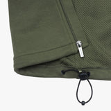 A close-up of the vest’s bottom hem, showing the drawstring adjustment.