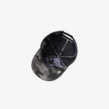 A black baseball cap with a gray camouflage pattern on the brim and a black dotted pattern on the back panels