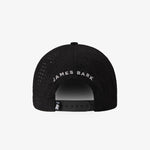 Black James Bark branded perforated baseball cap shown from the back, featuring white embroidered text