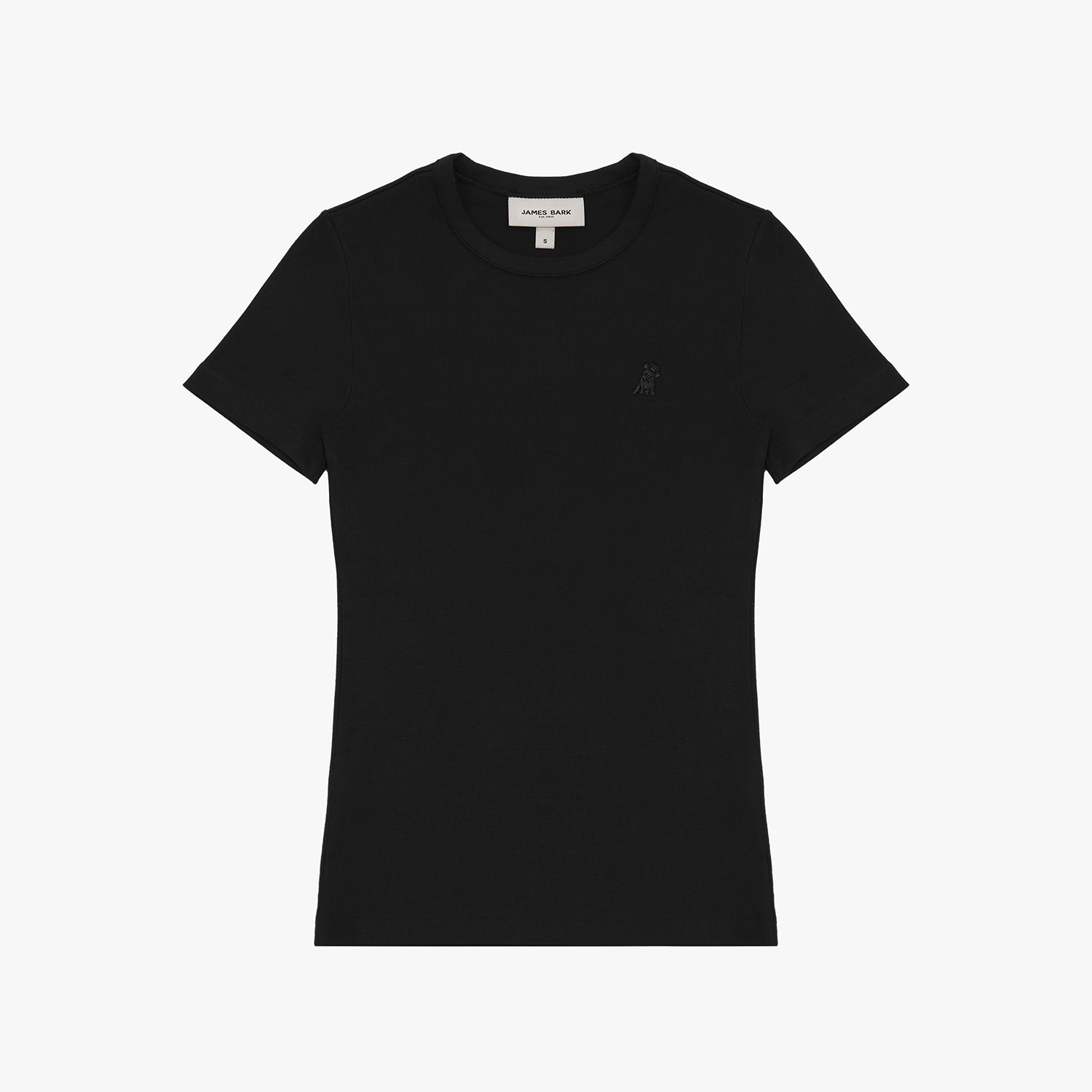 A black short-sleeve T-shirt laid flat on a white background. It features a ribbed crewneck collar and a fitted silhouette. A subtly embroidered logo of a dog, matching the black fabric, is positioned on the left chest area. The neckline includes a white label with black text displaying the brand "JAMES BARK" and the size "S." The fabric appears to be soft and high-quality.