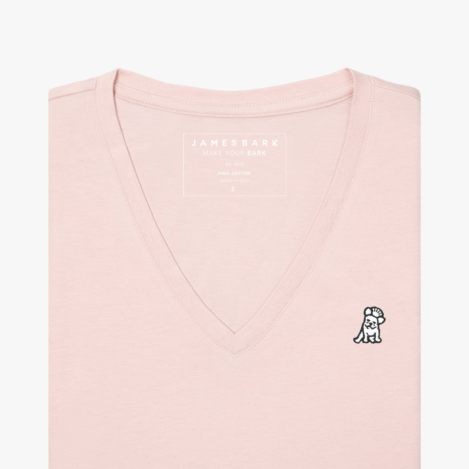 Front view of a light pink women's V-neck t-shirt laid flat against a white background, showing the short sleeves and the black and white embroidered logo on the left chest