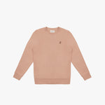 A dusty rose-colored crewneck sweatshirt laid flat on a white background. It features long sleeves, ribbed cuffs, and a ribbed hem. A small embroidered logo of a dog in a slightly darker shade is positioned on the left chest area. The neckline includes a white label with black text displaying the brand "JAMES BARK." The fabric appears soft and comfortable.