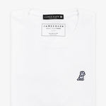 A white T-shirt laid flat against a white background, showing the front side with a small embroidered logo.